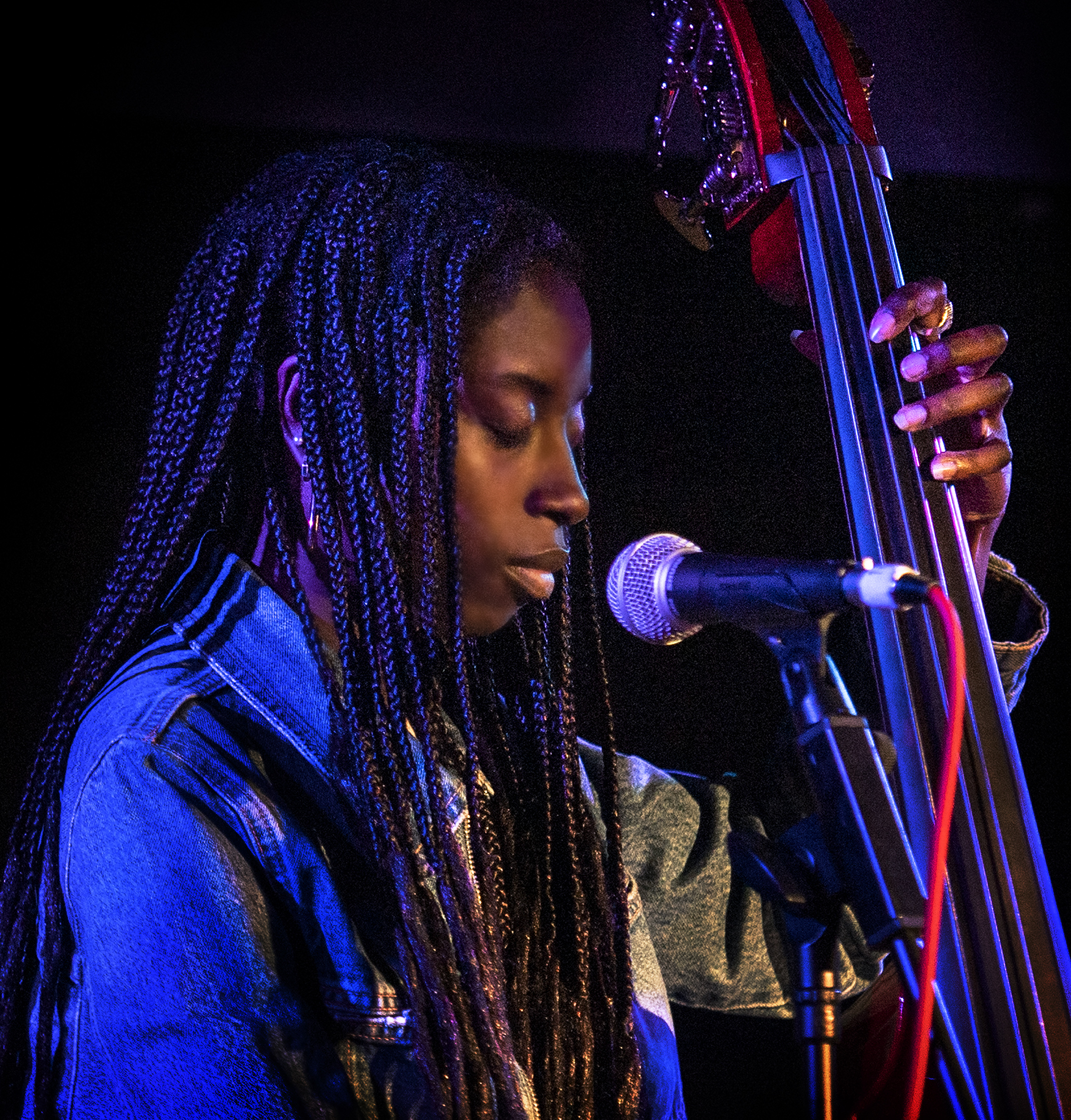 Close up colour photo of Amy Gadiaga with her double bass