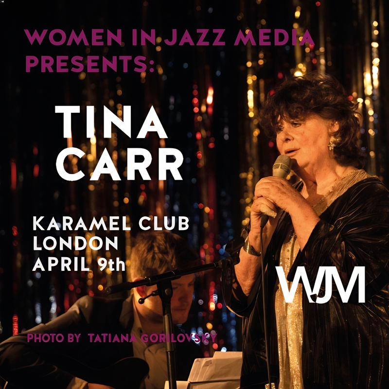 Colour photo of Tina singing at a microphone