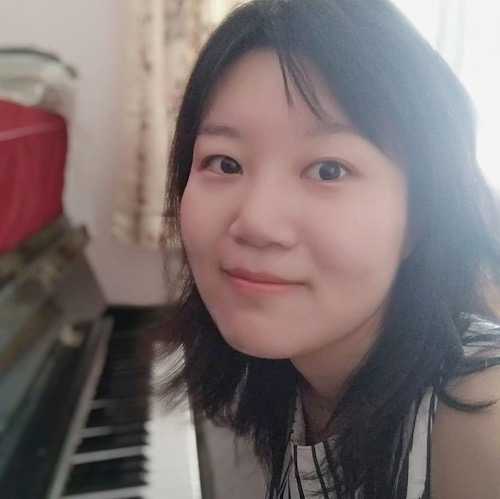 Headshot of Jiaowei Hu - a member of the Women in Jazz Media team team