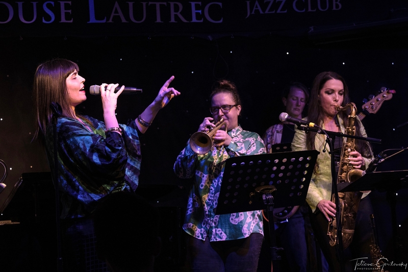 Colour photo of the all female london gay big band looking fabulous - taken by Photo by Tatiana Gorilovsky